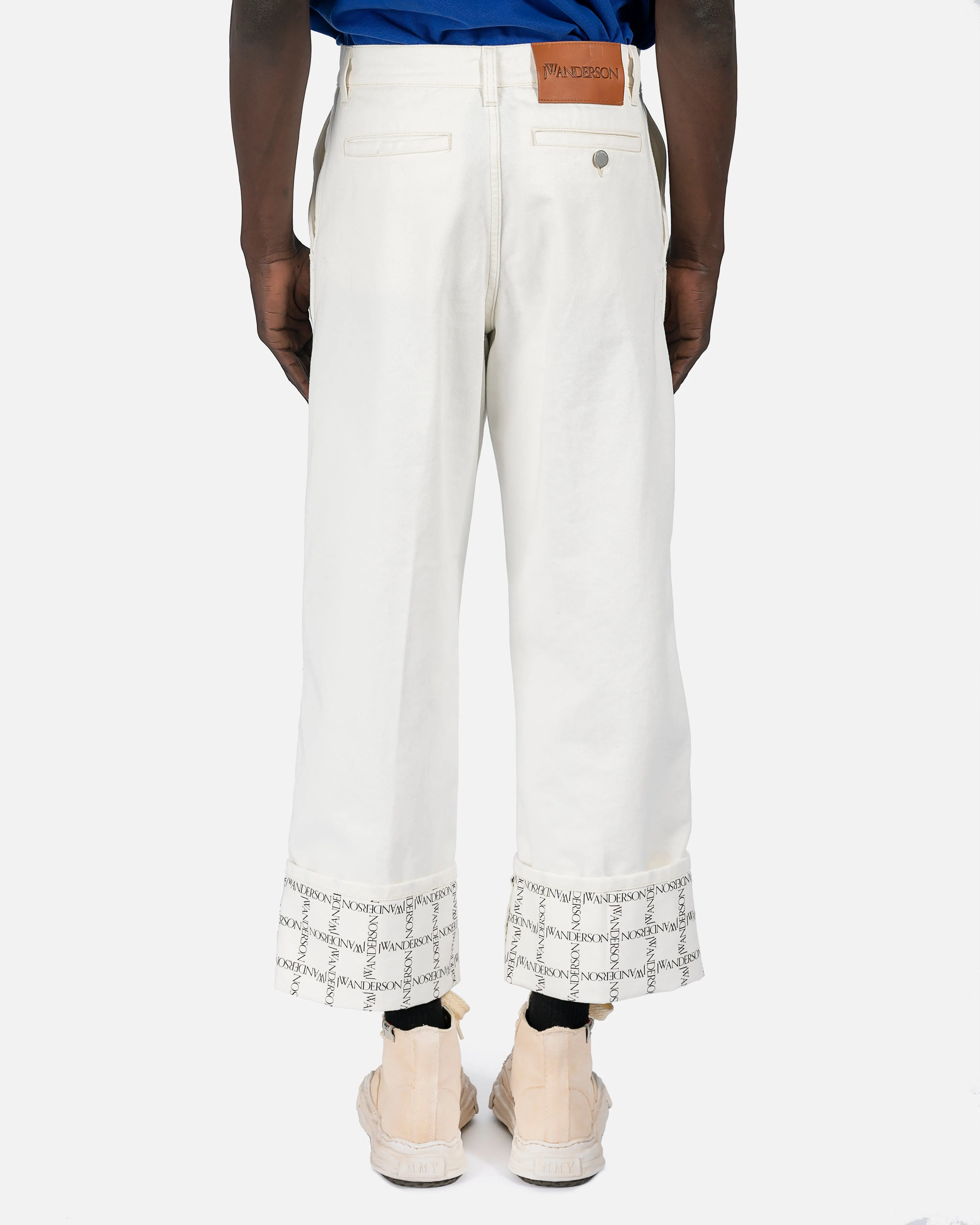 JW Anderson Logo Grid Cuff Wide Leg Jeans in Off-White