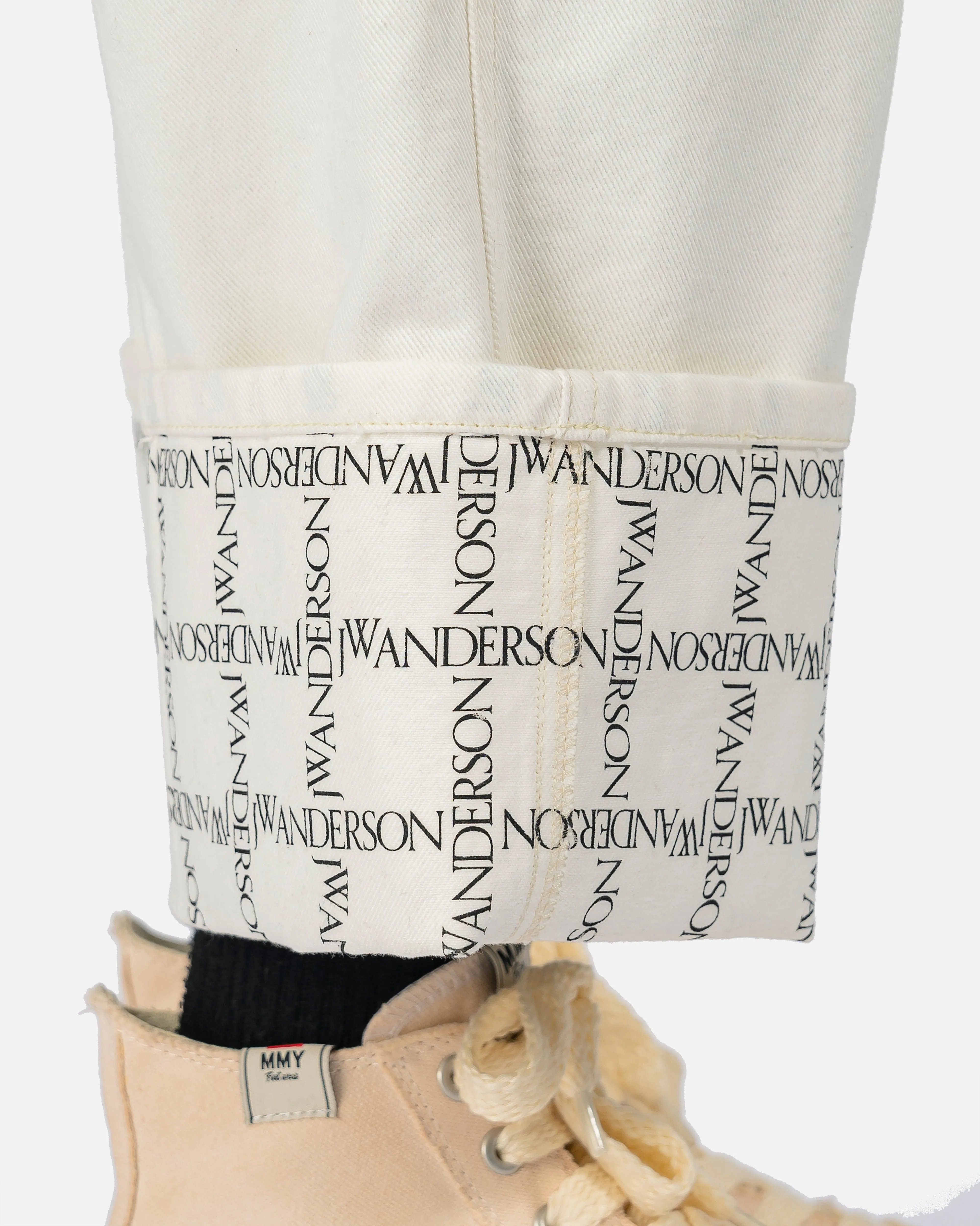 JW Anderson Logo Grid Cuff Wide Leg Jeans in Off-White